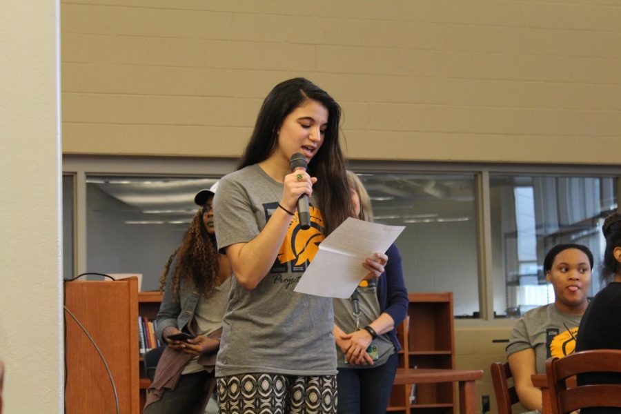 Aya Bellaoui leads Project LIT BHS in a trivia game about the novel, Dear Martin.