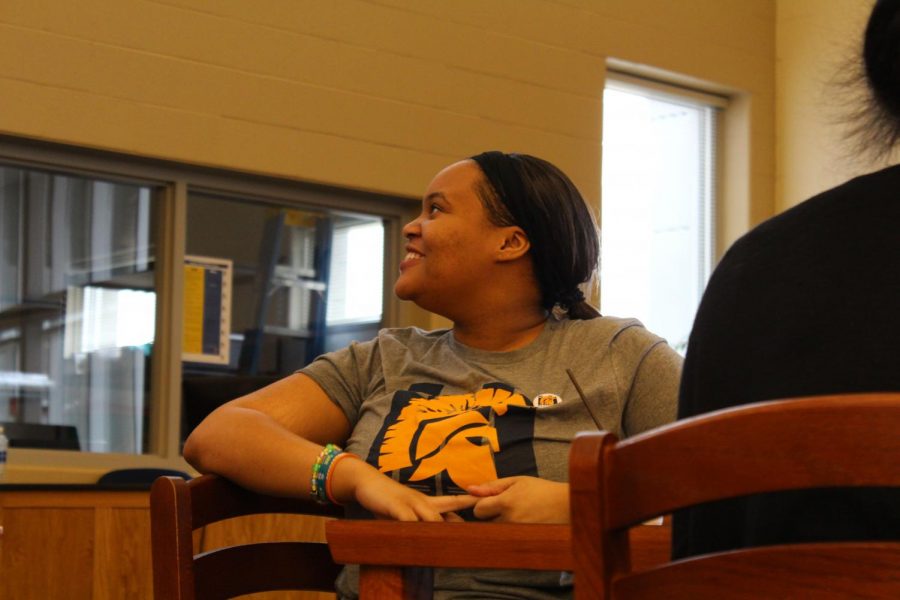 Imani Mitchell excitedly listens to Nic Stone talk about her book, Dear Martin.