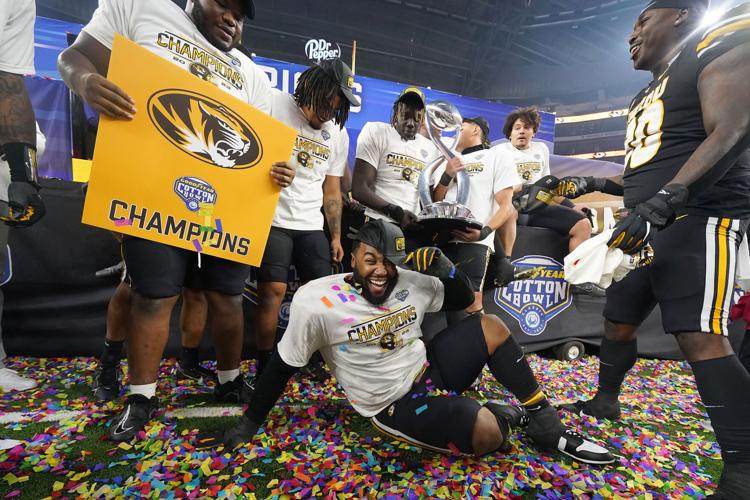 Mizzou football defensive lineman Kristian Williams celebrates winning the Cotton Bowl