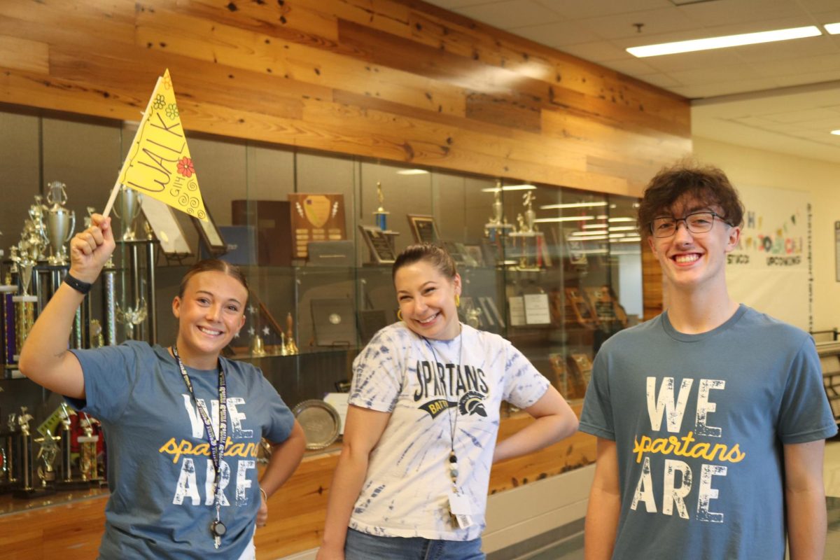 Senior Link Leader Charlie Alderton and teachers Ms Walk and Ms Green pose for picture on Jump Start Day. Before the first day of school freshman participated in a Jump Start Day full of games, activities, and tours around the school.